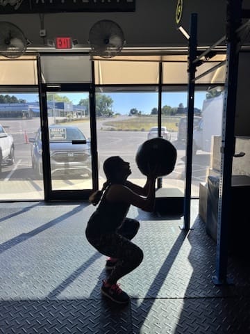 Woman Using Medball